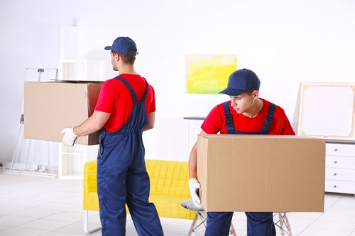 Local man and van loading furniture near Highbury homes