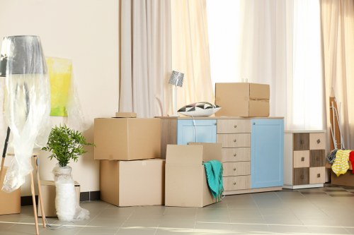 Removal team preparing items for a house move