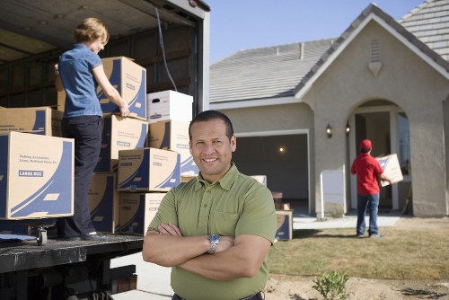 Moving team navigating a Highbury flat or townhouse relocation