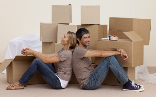 Local removals team handling furniture for a Highbury property move