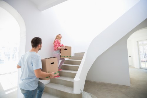 Local packing team handling fragile items in Highbury