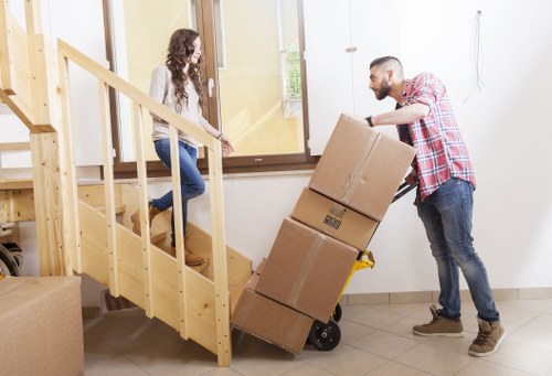Local office movers handling desks and equipment in a Highbury commercial move