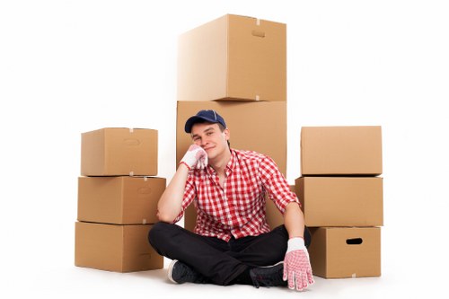 Packed office crates and furniture prepared for a business move in Highbury