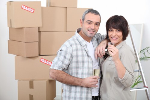 Removal truck and team preparing for a move in Highbury suburbs